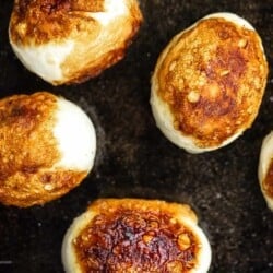 Hard boiled fried eggs in a cast iron pan