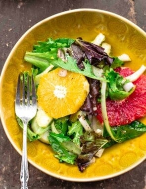 dressed fresh salad in a bowl