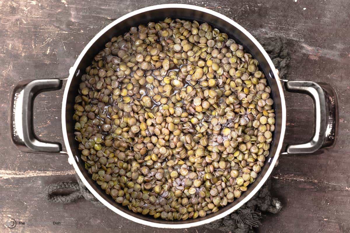 cooked lentils in a pot.