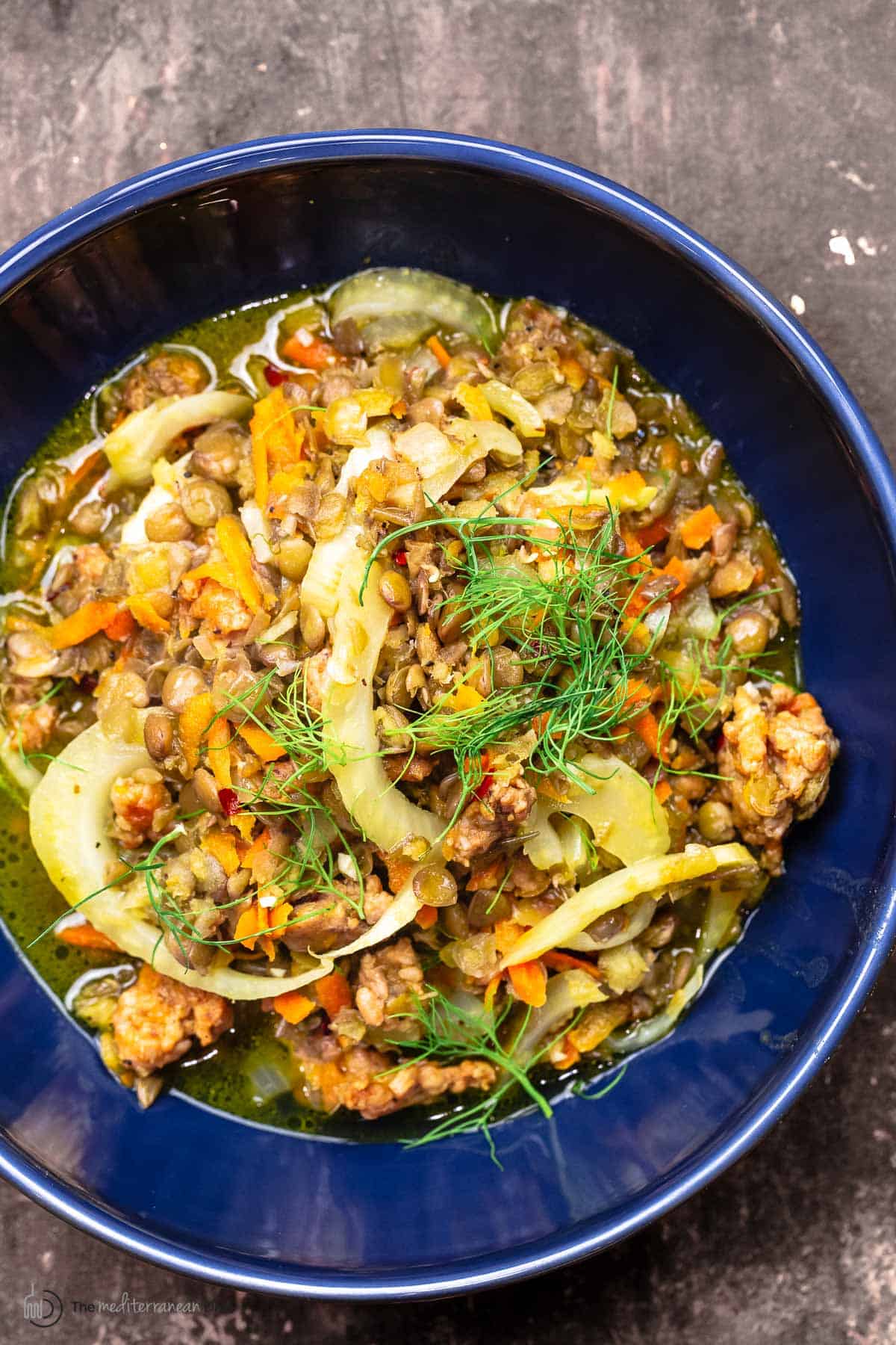 sausage and lentils with fennel in a bowl