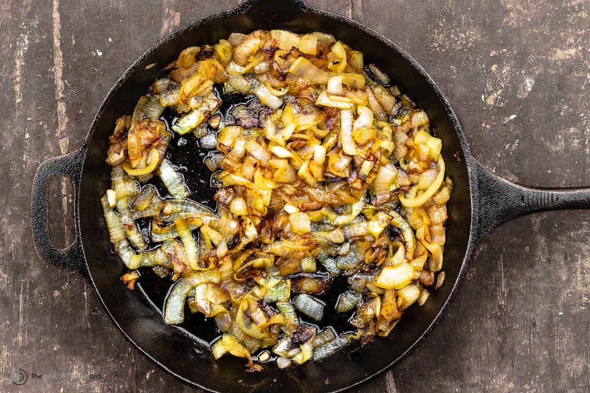 caramelized yellow onions in a cast iron skillet