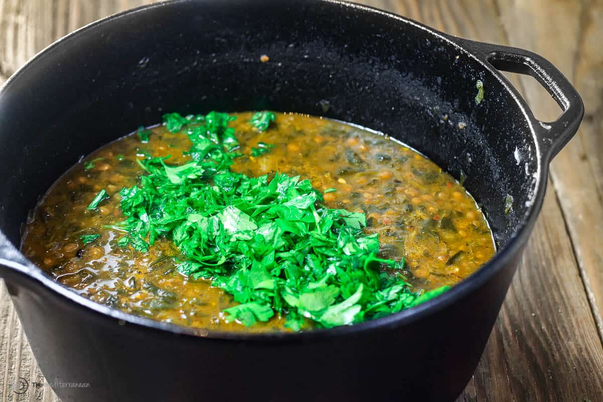 lentil soup topped with fresh parsley
