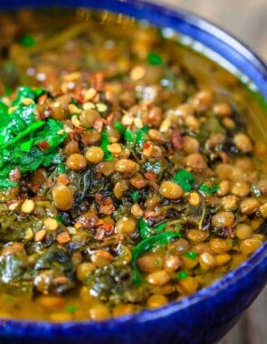 close up of lentils, spinach, and fresh parsley