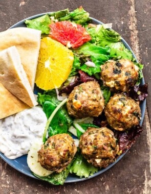 meatballs with citrus salad, pita, and yogurt dip