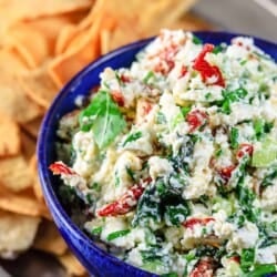 feta dip served with crackers and pita chips
