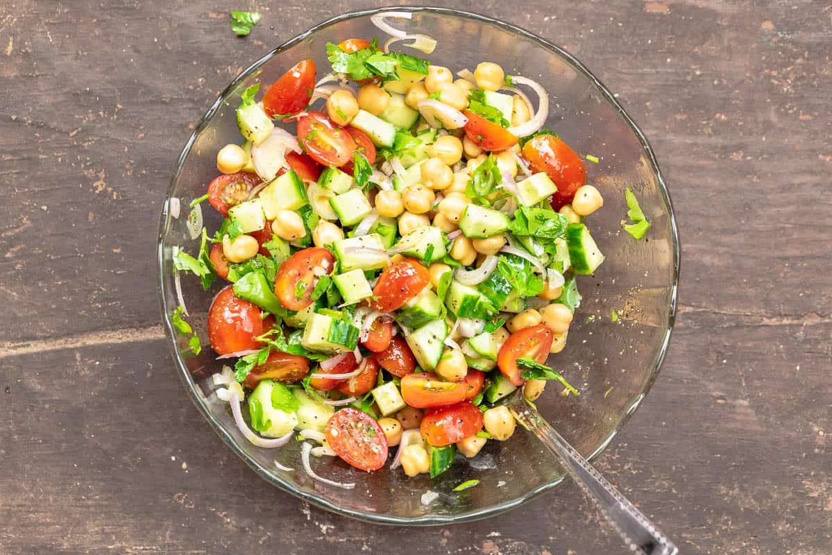 Mediterranean salad with chickpeas, tomatoes, and cucumbers