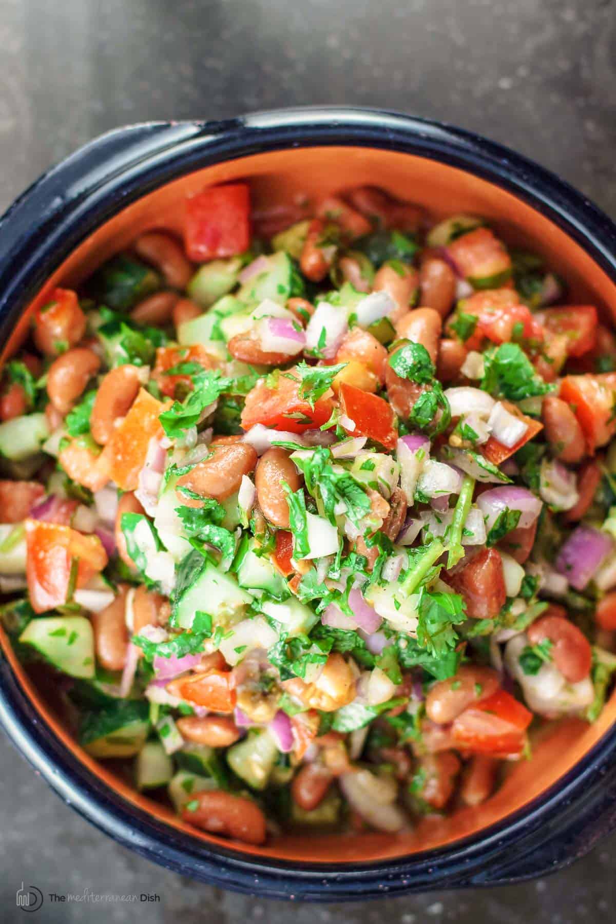 Kidney bean salad with cucumber, tomato, onion, cilantro and Dijon vinaigrette