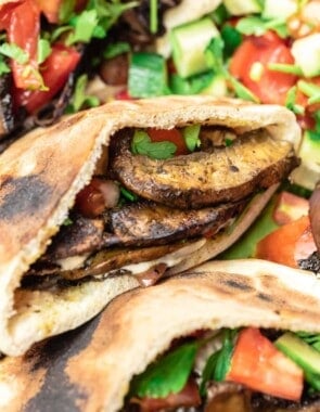 mushroom shawarma in pita bread served with Mediterranean salad