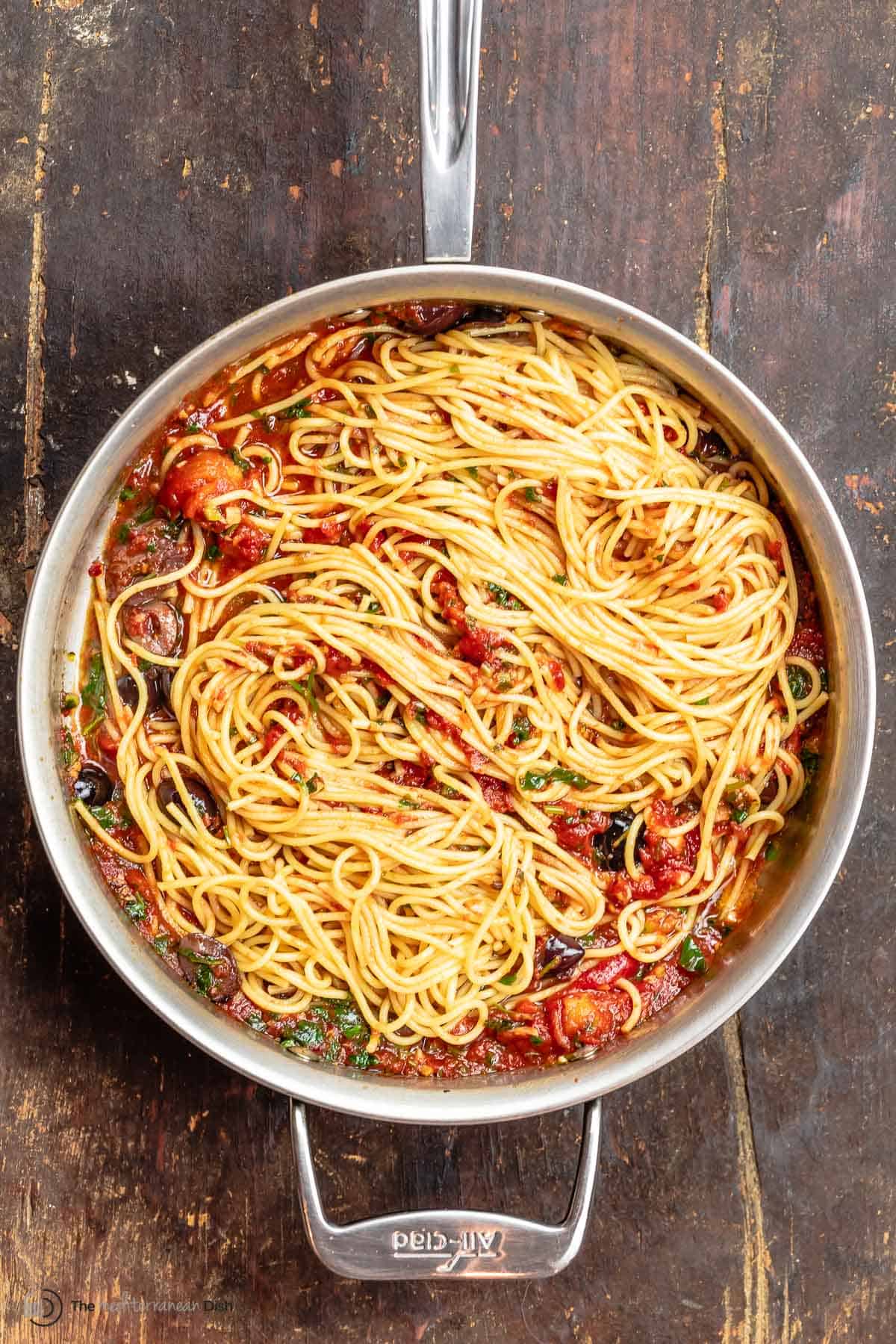 pasta puttanesca in a large saucepan