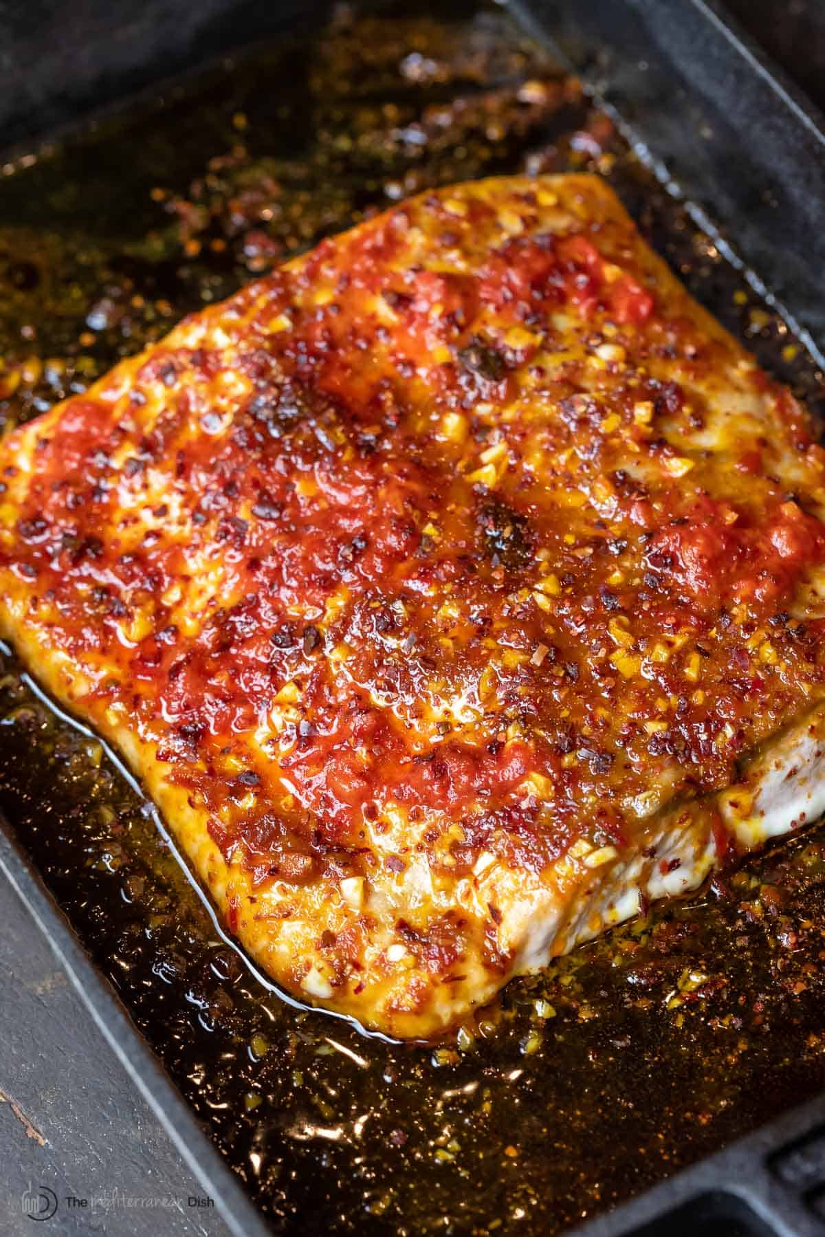 salmon with spicy harissa-lime sauce