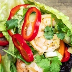 lettuce wraps with shrimp, peppers, Italian parsley, and green onion