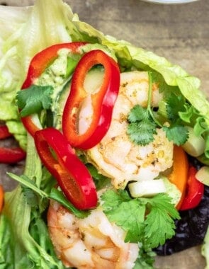 lettuce wraps with shrimp, peppers, Italian parsley, and green onion