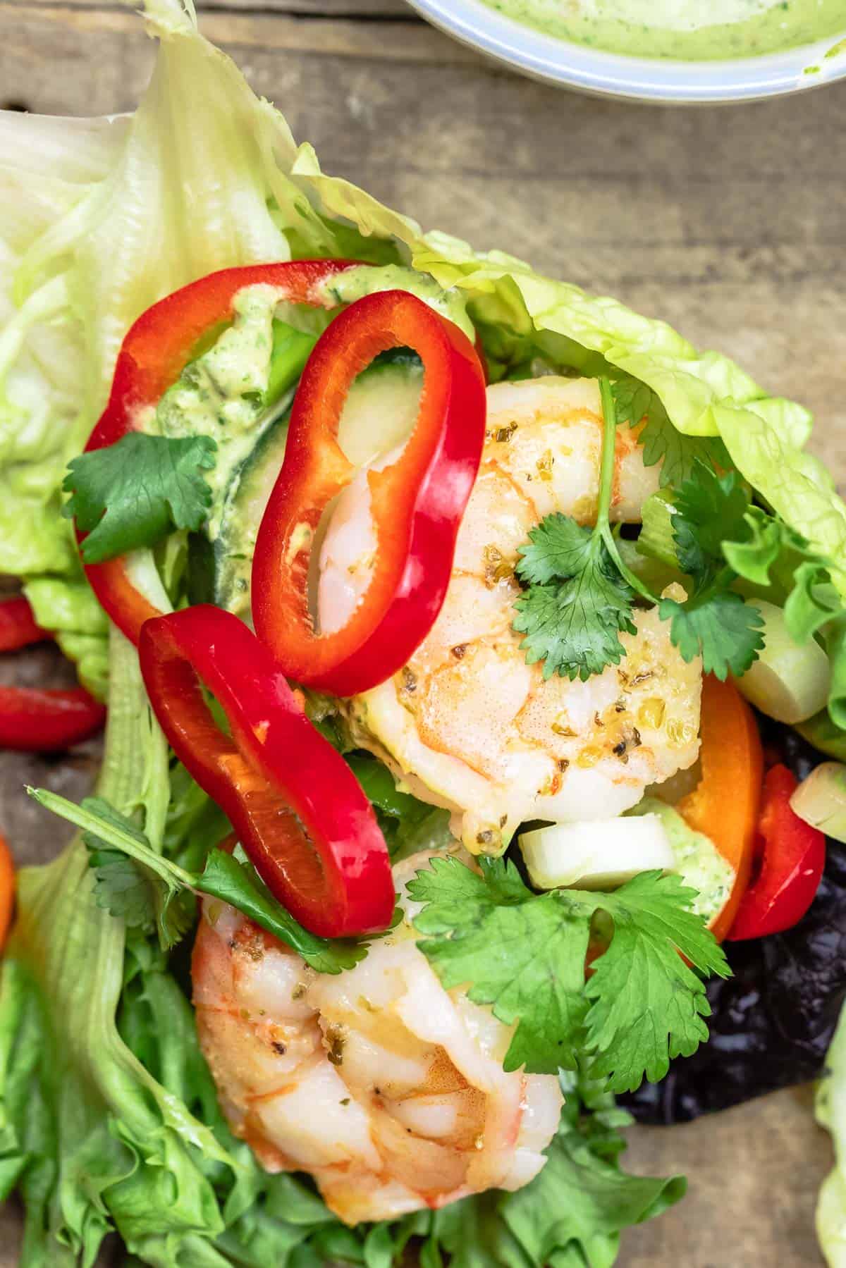 lettuce wraps with shrimp, peppers, Italian parsley, and green onion