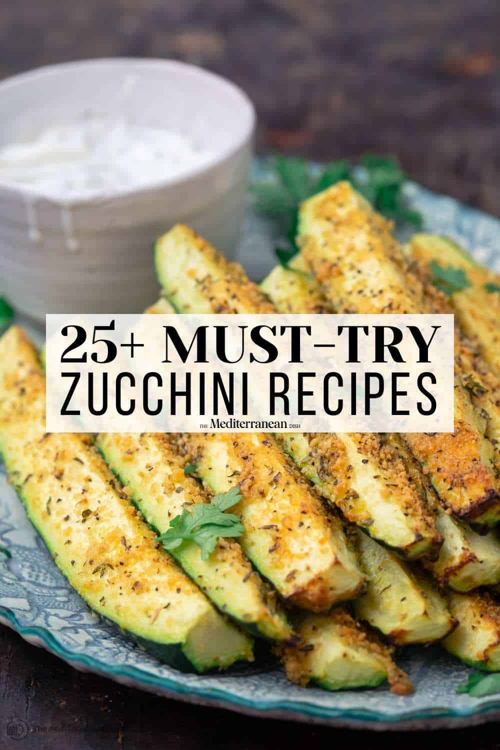 image and pin image 2 for easy zucchini recipes featuring baked zucchini spears with parmesan cheese.