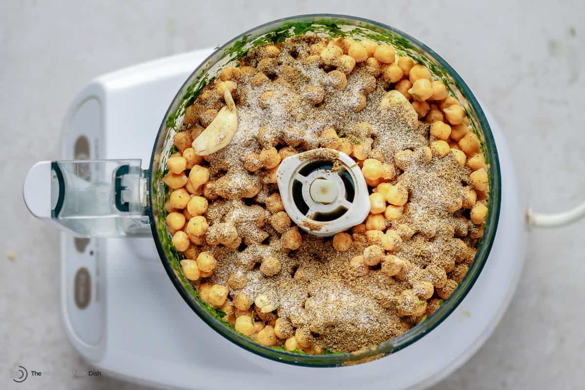 air fryer falafel ingredients in a food processor before being blended together.