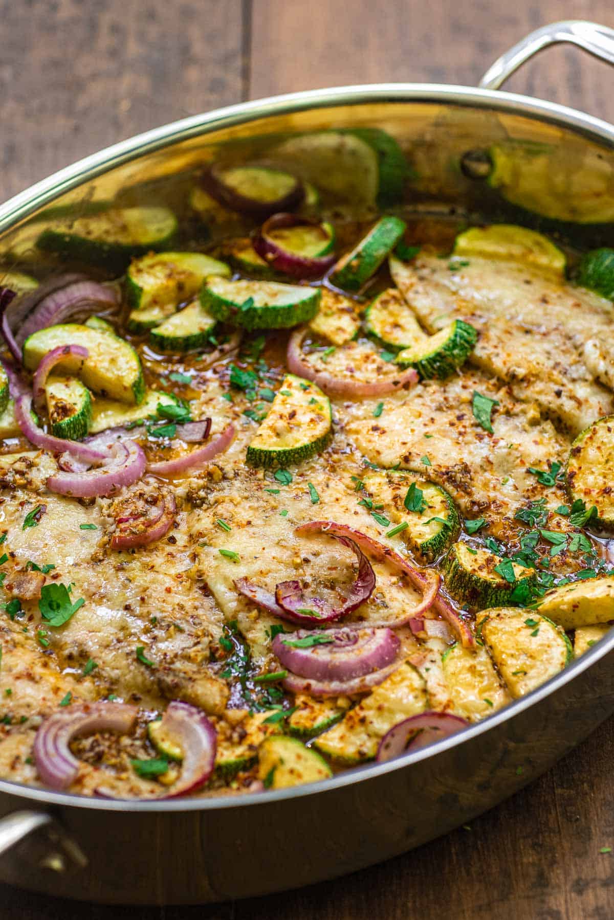 flounder recipe with vegetables in a baking pan.