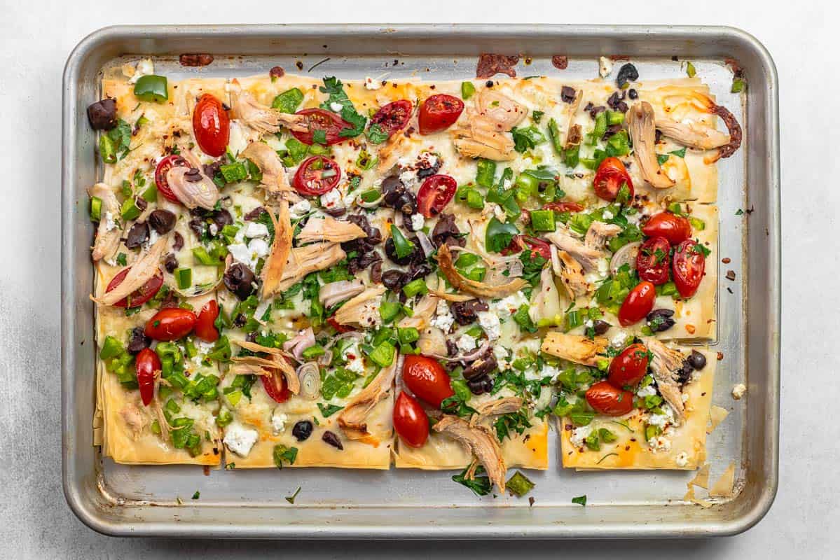 phyllo dough pizza on a baking sheet.