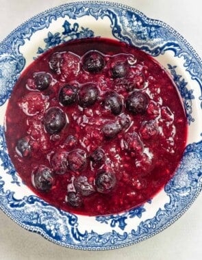 fruit compote in a blue and white bowl.