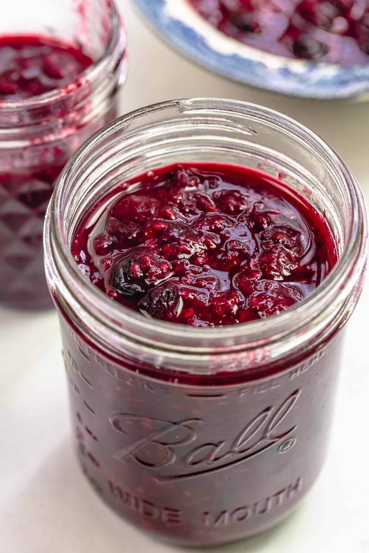 close up of Mason jar filled with compote.