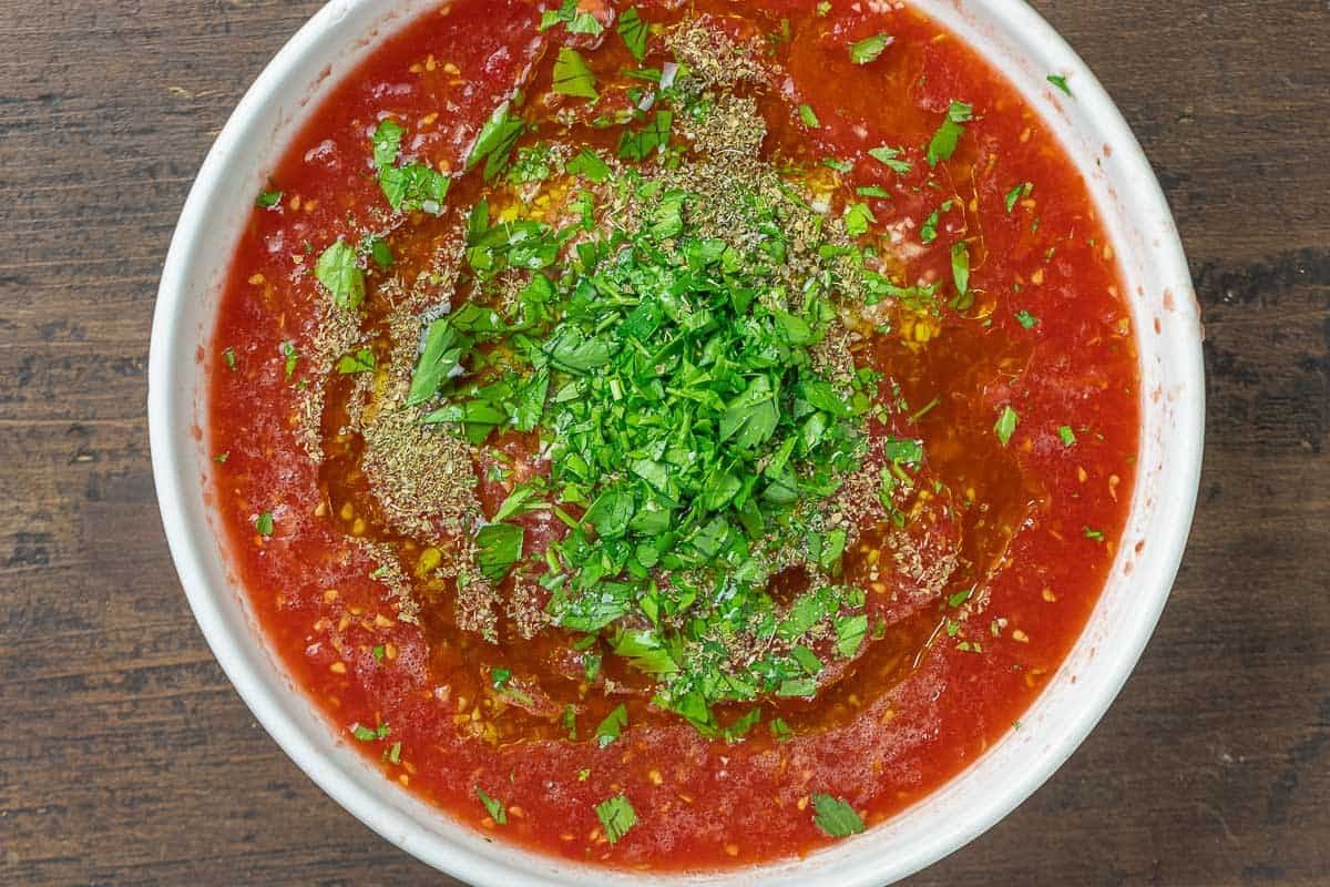 fresh tomato sauce with a generous sprinkle of fresh parsley.