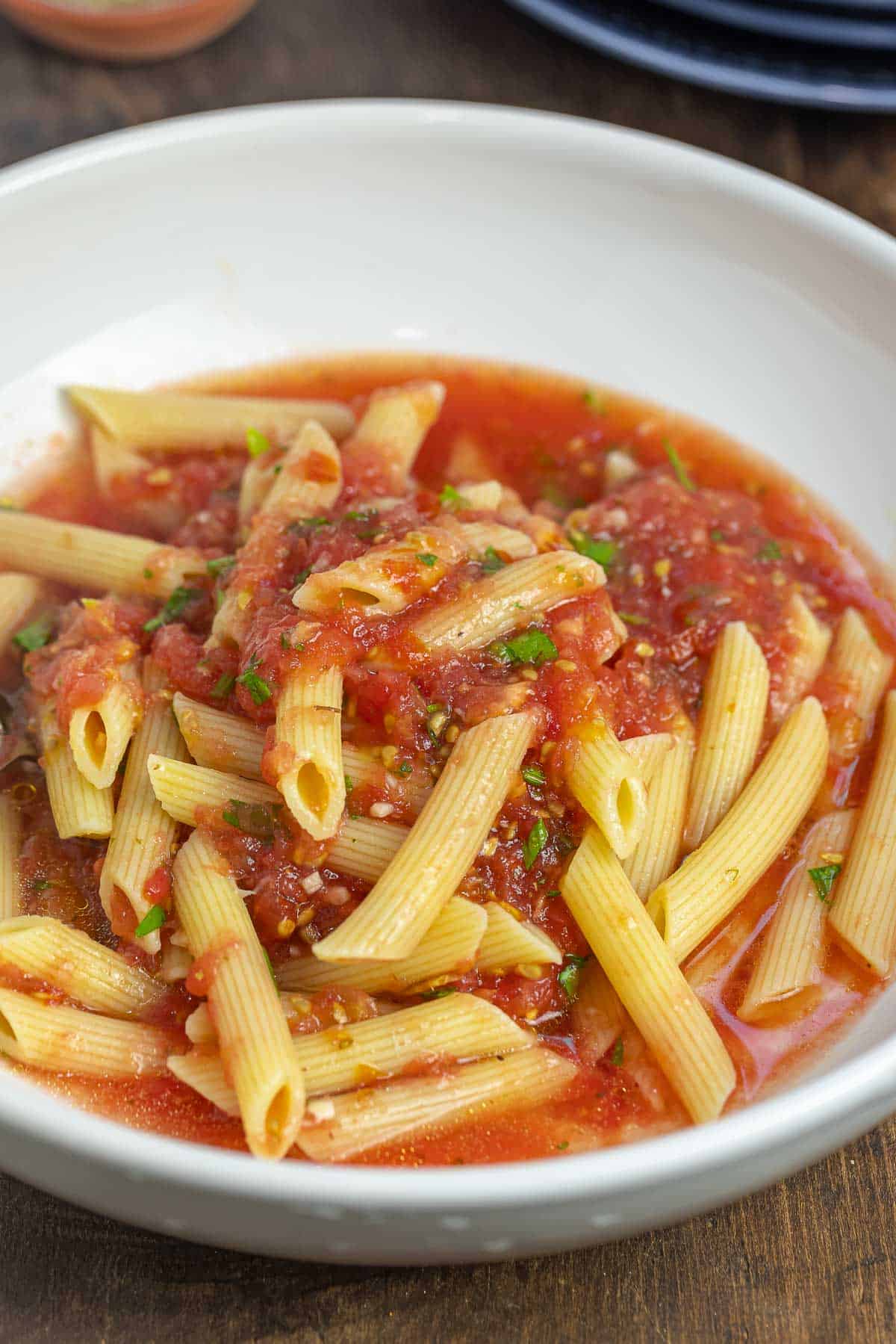 cooked penne tossed with no-cook tomato sauce (pomodoro crudo)