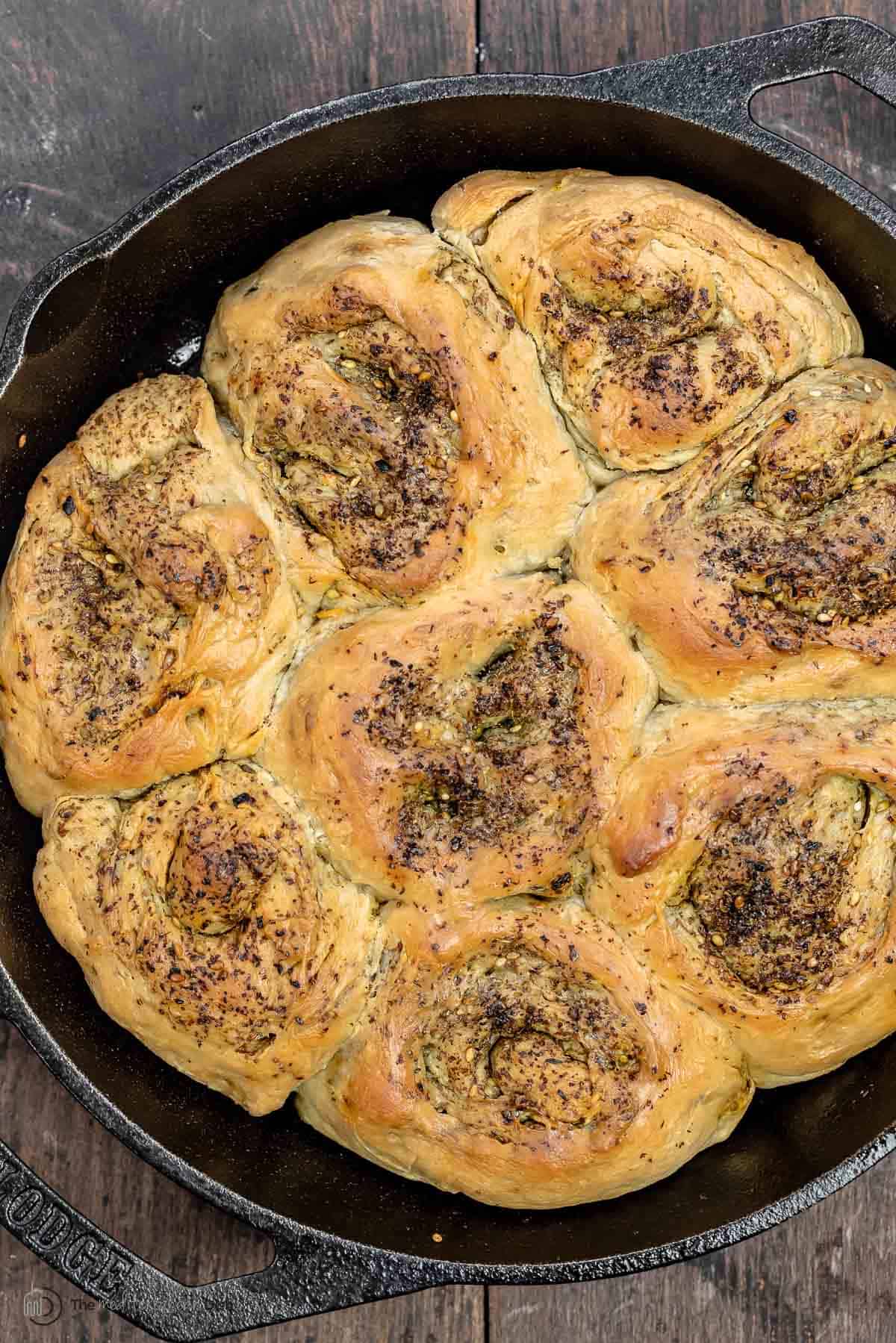 za'atar bread rolls in a skillet.