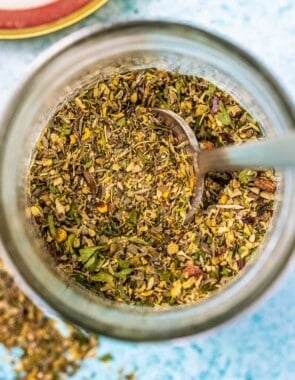 Homemade Italian seasoning in a glass jar.