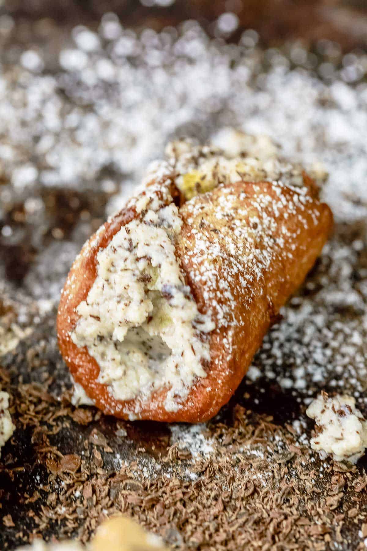 close up of a single cannolo.