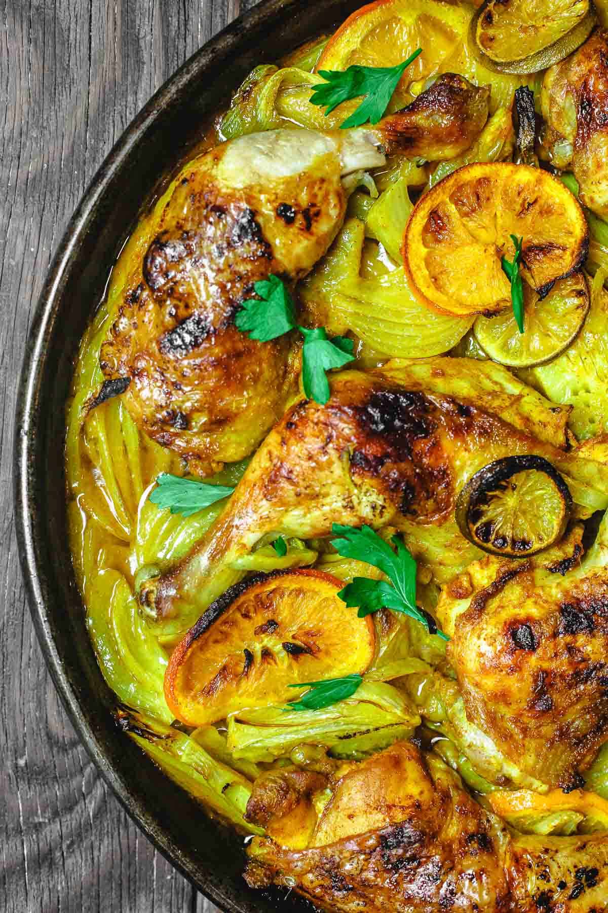close up of roasted chicken with turmeric, fennel, and citrus.