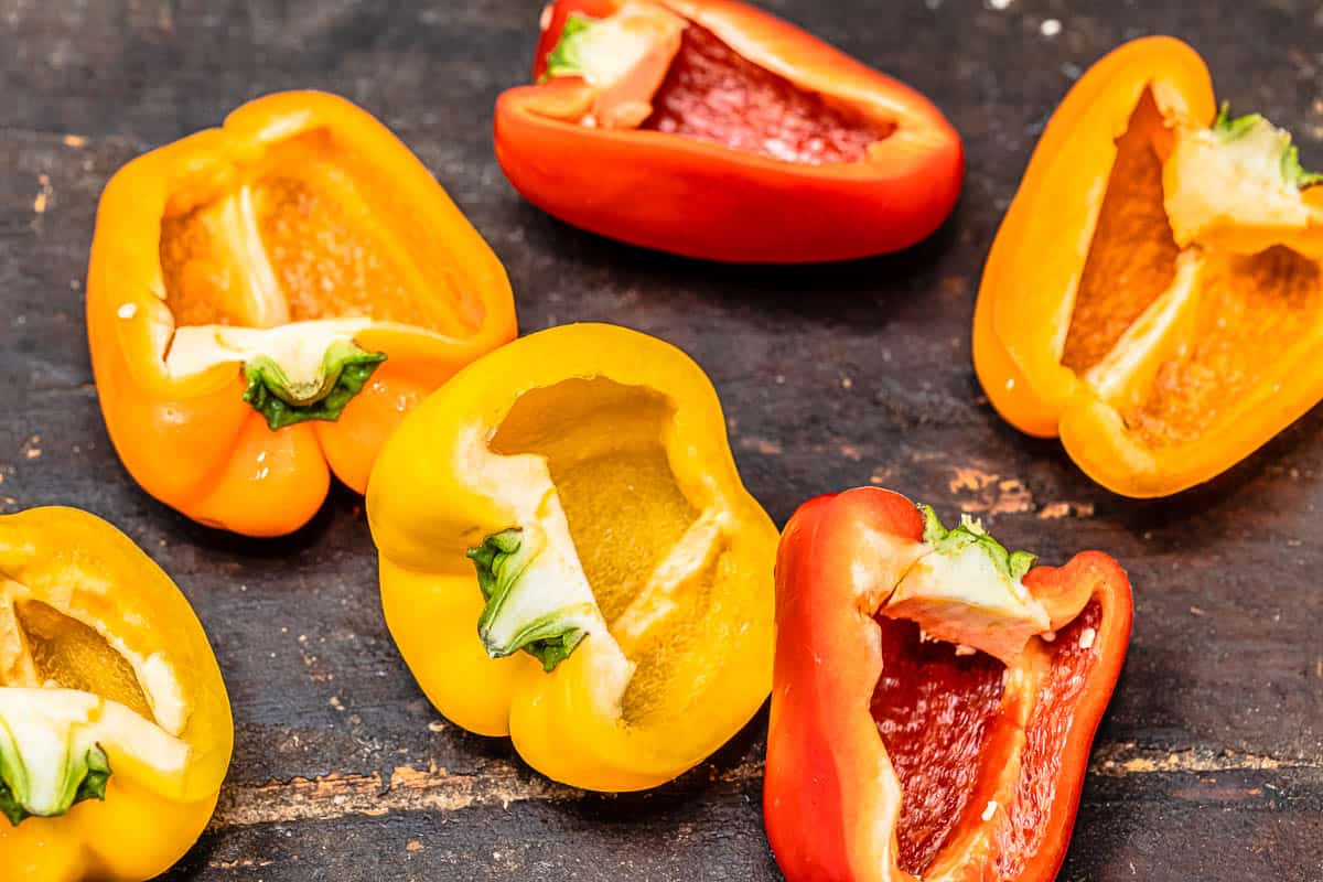 large red and yellow peppers, halved, cored, and seeded.