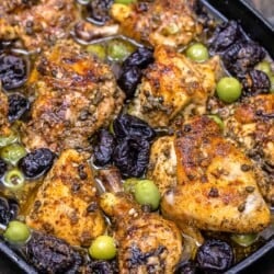 chicken marbella in a large baking dish.