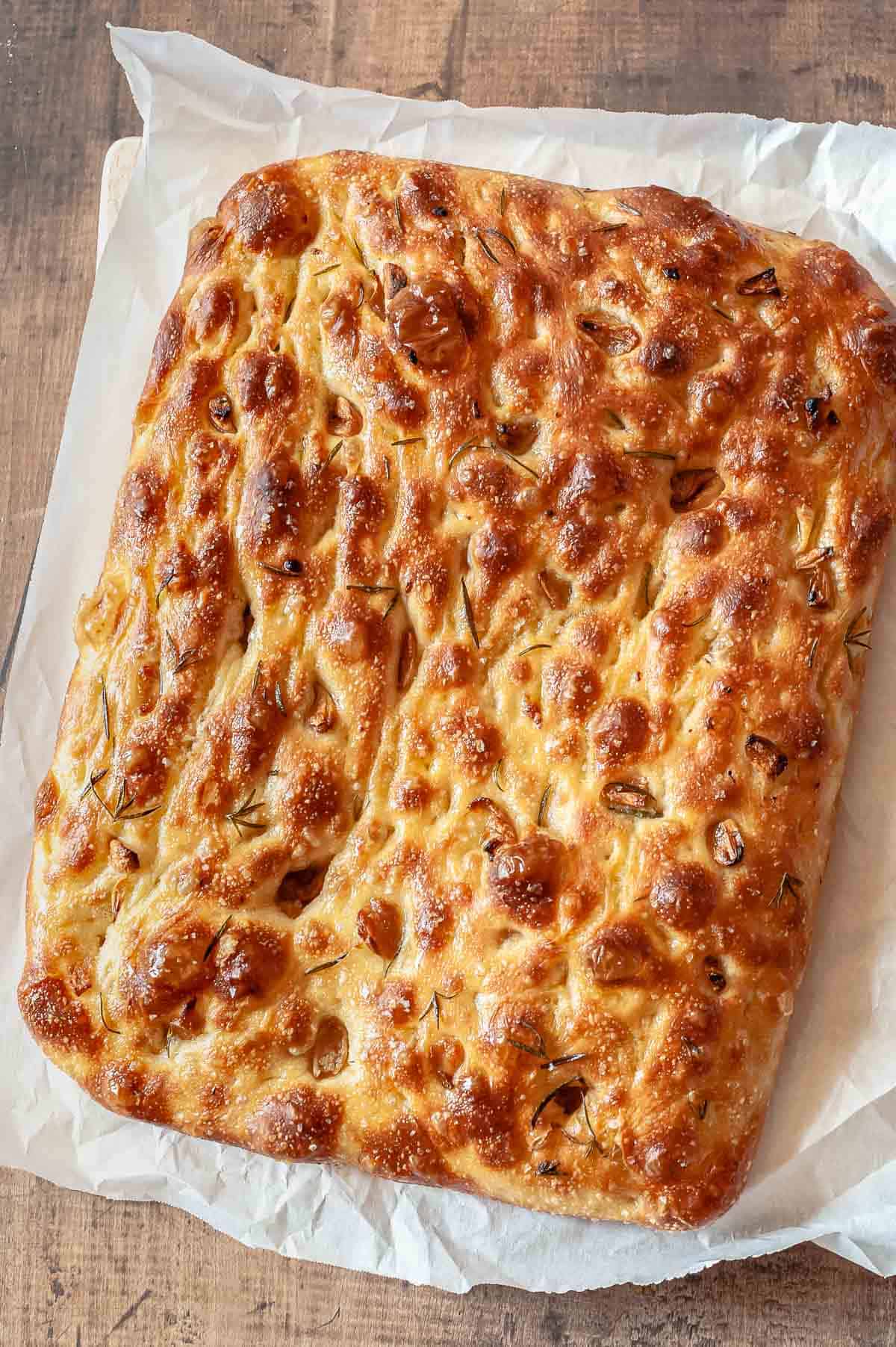 focaccia recipe on a wooden surface.