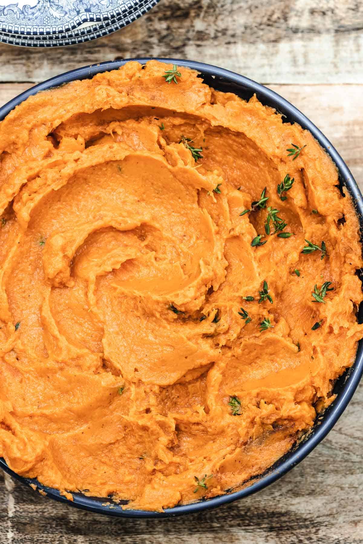 savory mashed sweet potatoes with herbs and garlic.