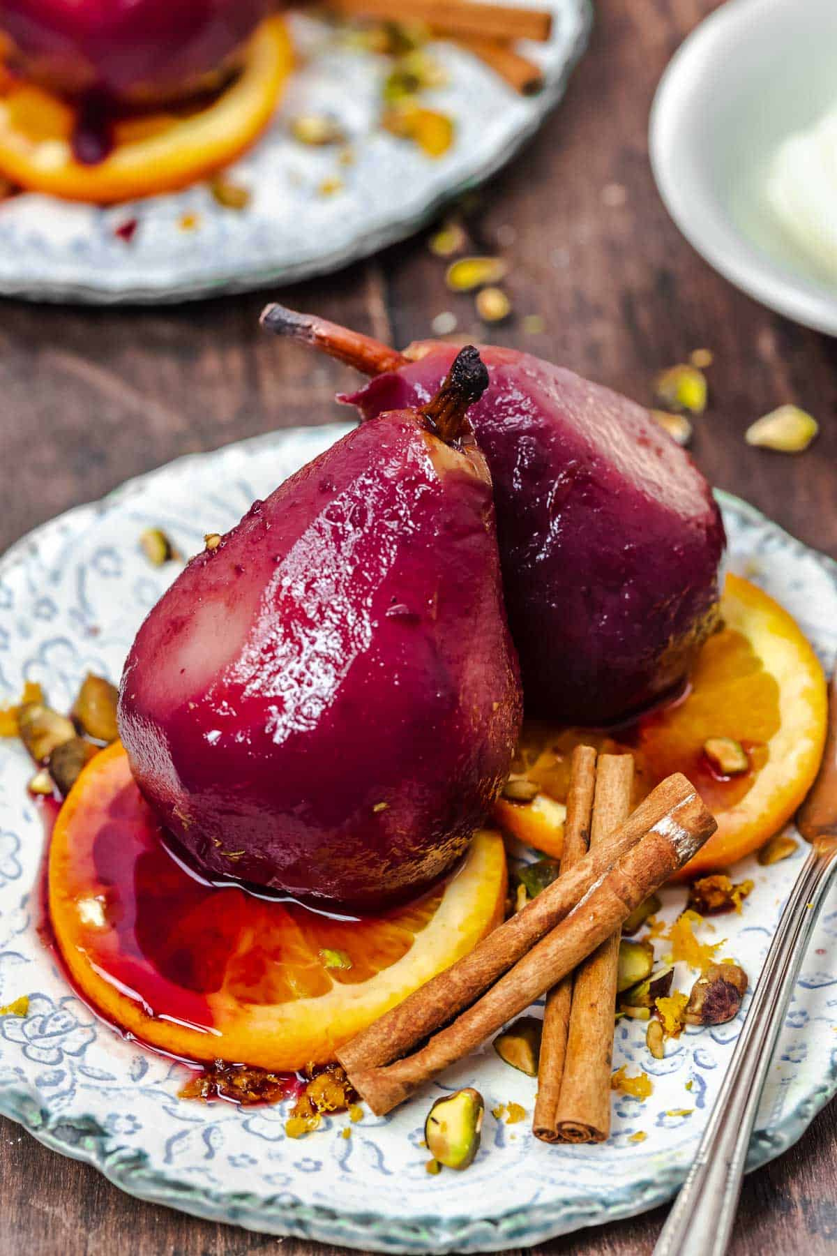 poached pear recipe with red wine, oranges, and spices.