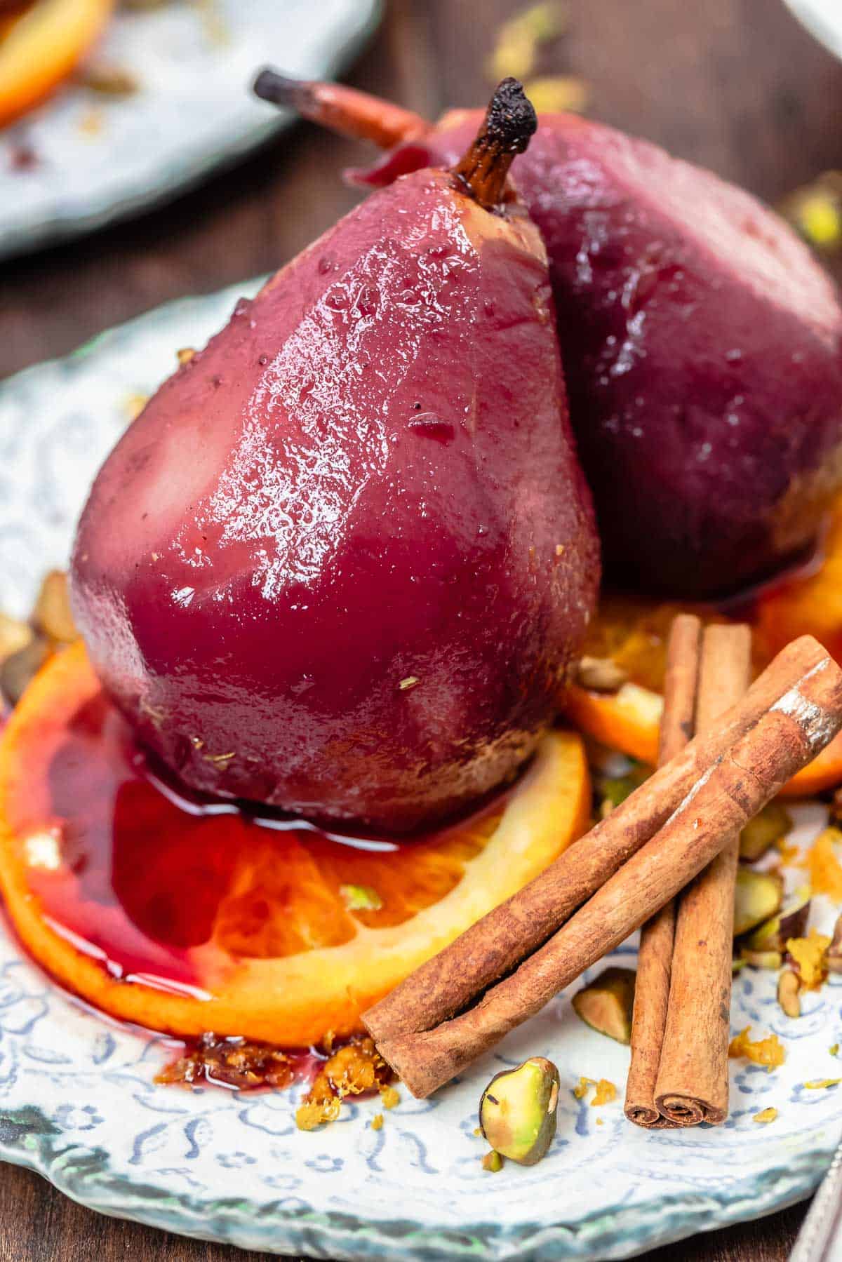 poached pears on a plate.