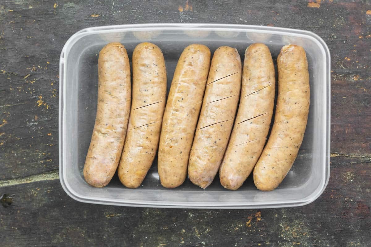 precooked and scored chicken sausage links.