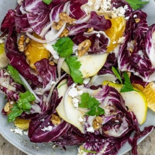 radicchio salad with pears, oranges shallots, walnuts and feta cheese.