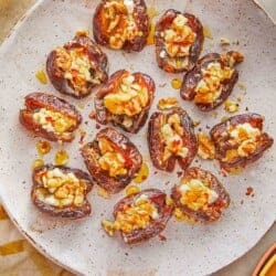 overhead shot of cheese stuffed dates on a plate.