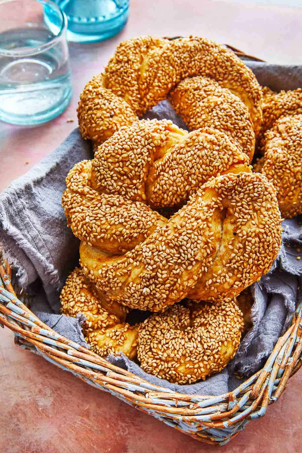 baked simit dough rings in a basket.