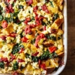 close up of cooked breakfast strata in a baking dish.