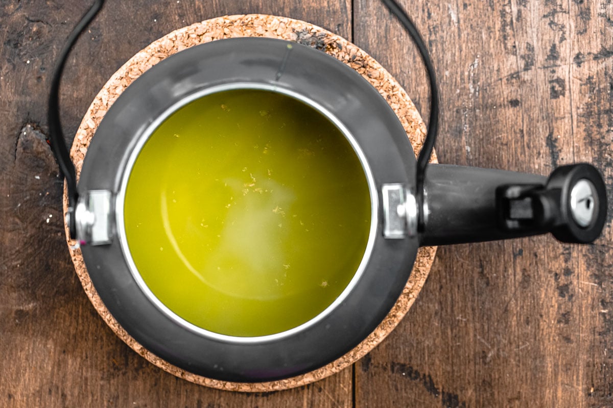 ginger tea in a metal tea kettle.