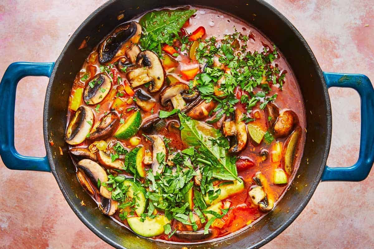 homemade vegetable soup in a dutch oven.