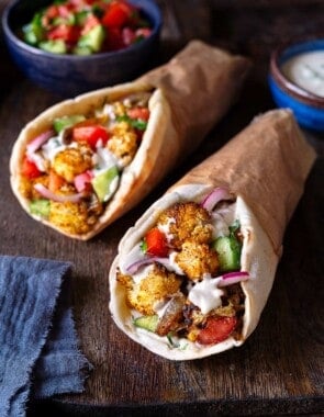 two cauliflower shawarma pitas.