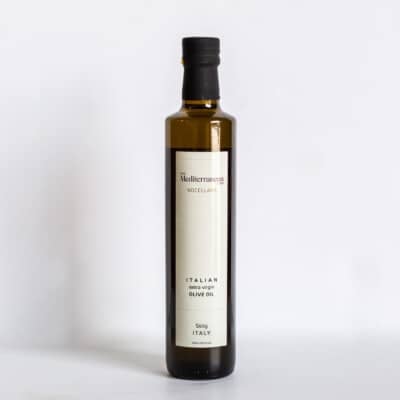a bottle of nocellara Italian extra virgin olive oil from the mediterranean dish.