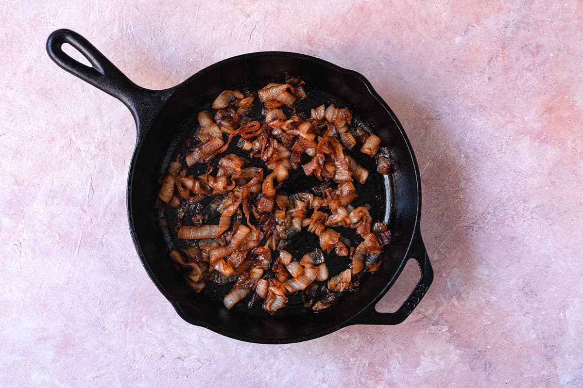 sauteed onions in a cast iron skillet.