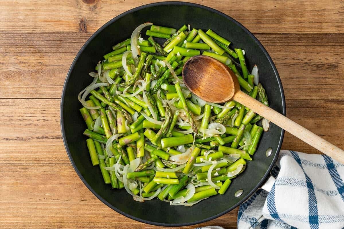 Onions, asparagus, and garlic in a large saute pan.