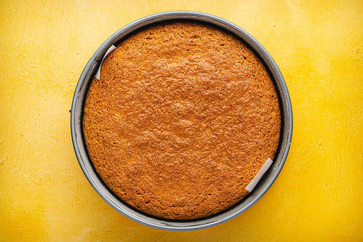 Baked Torta di Carote (Italian Carrot Cake) in a round cake pan.