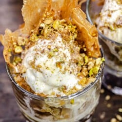 close up of a baklava ice cream sundae in a bowl.