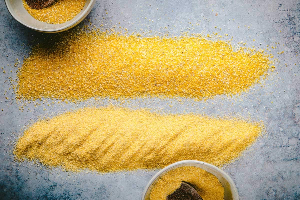 examples of coarse-grind and fine-grind polenta on a table.