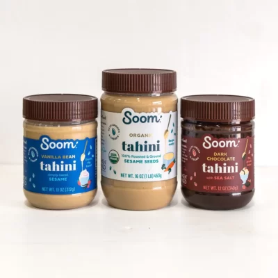 Image of three jars of tahini, including vanilla bean, original, and dark chocolate.